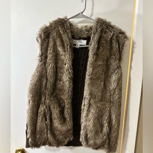 Sebby fur vest with knitted back.